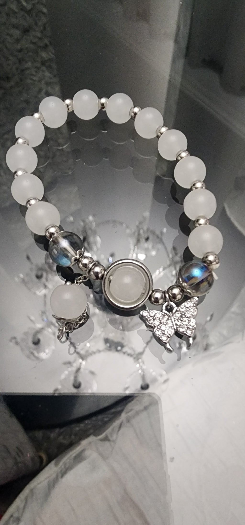 -Moonstone bracelet with butterfly charm