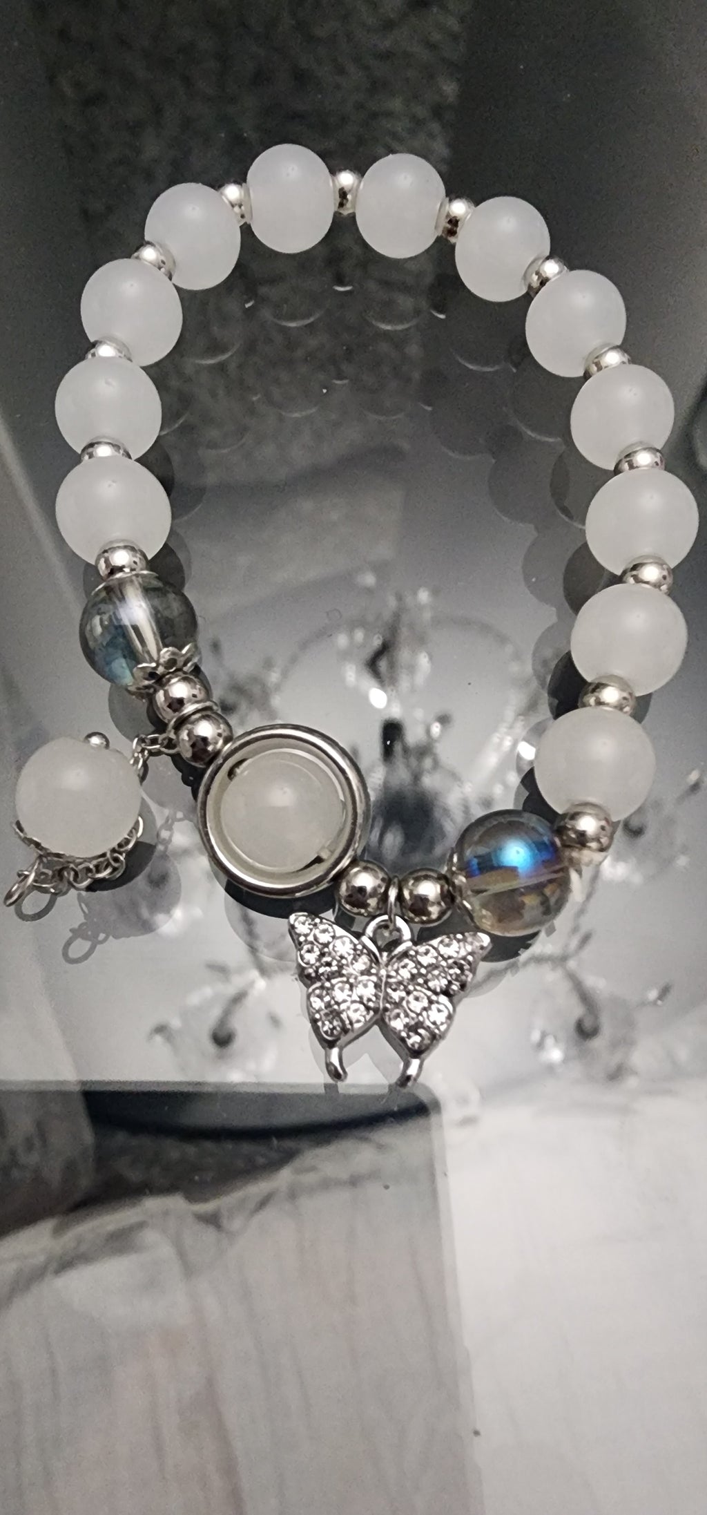 -Moonstone bracelet with butterfly charm
