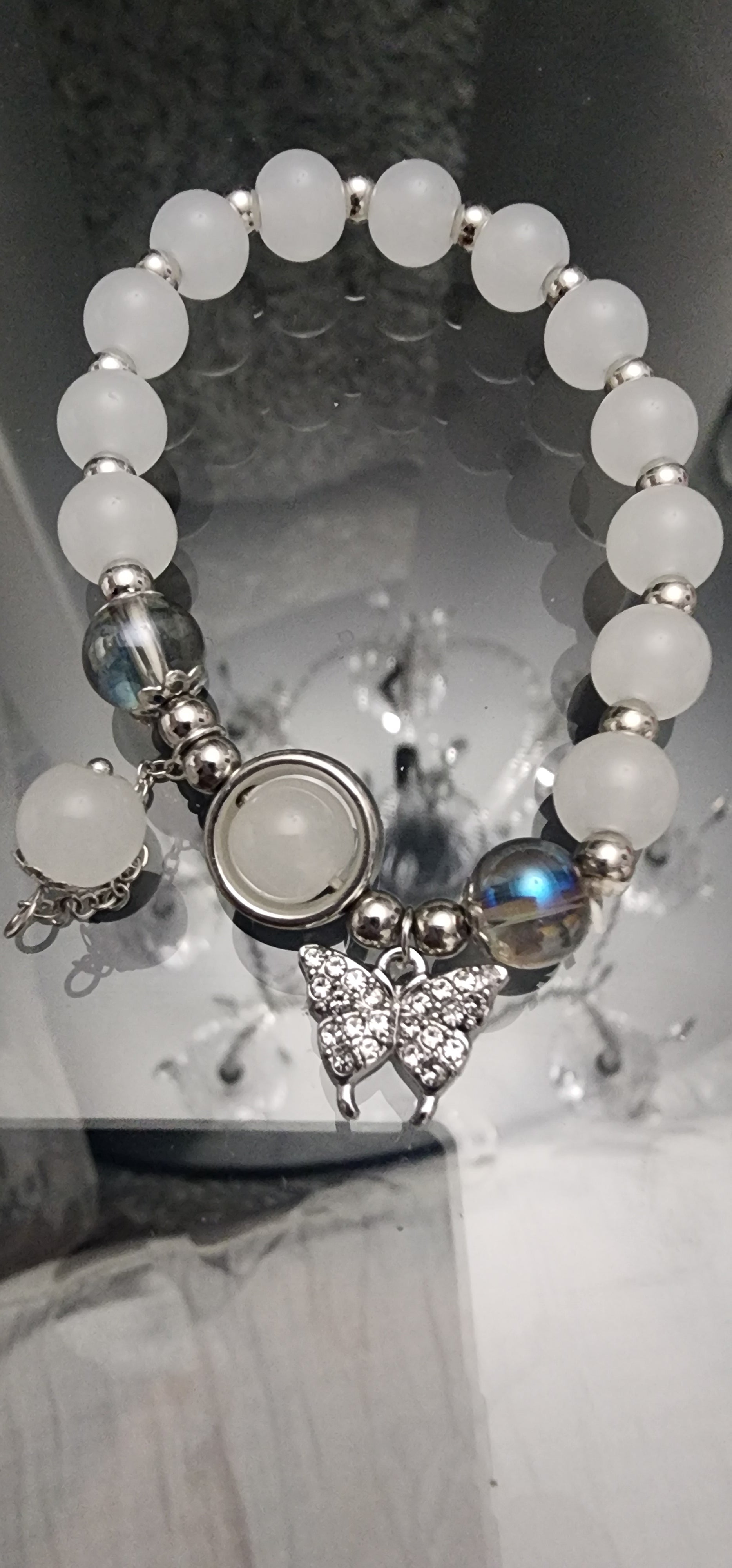 -Moonstone bracelet with butterfly charm