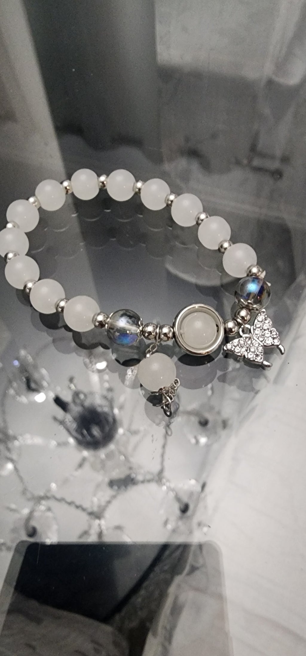 -Moonstone bracelet with butterfly charm
