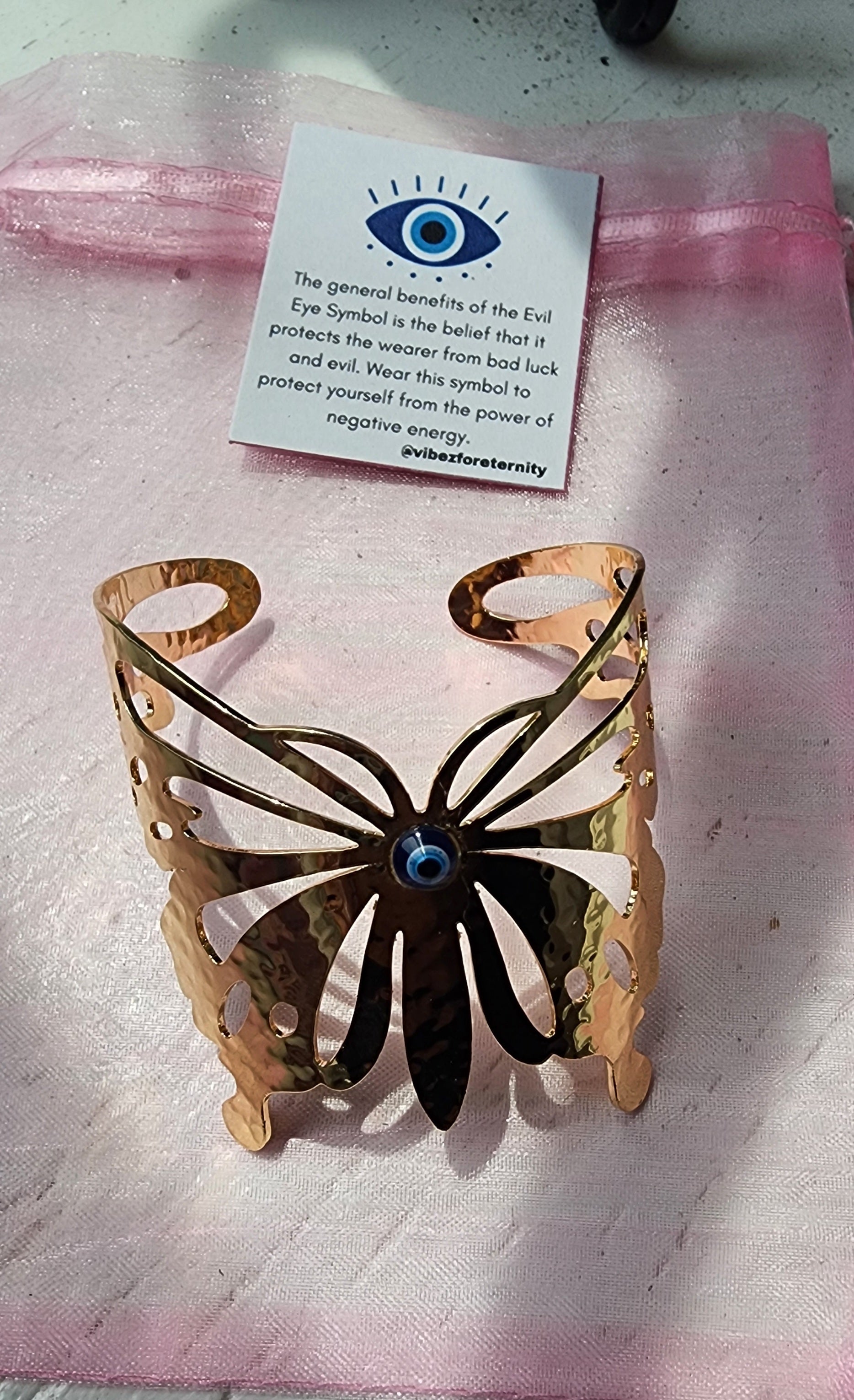 -Gold evil eye butterfly