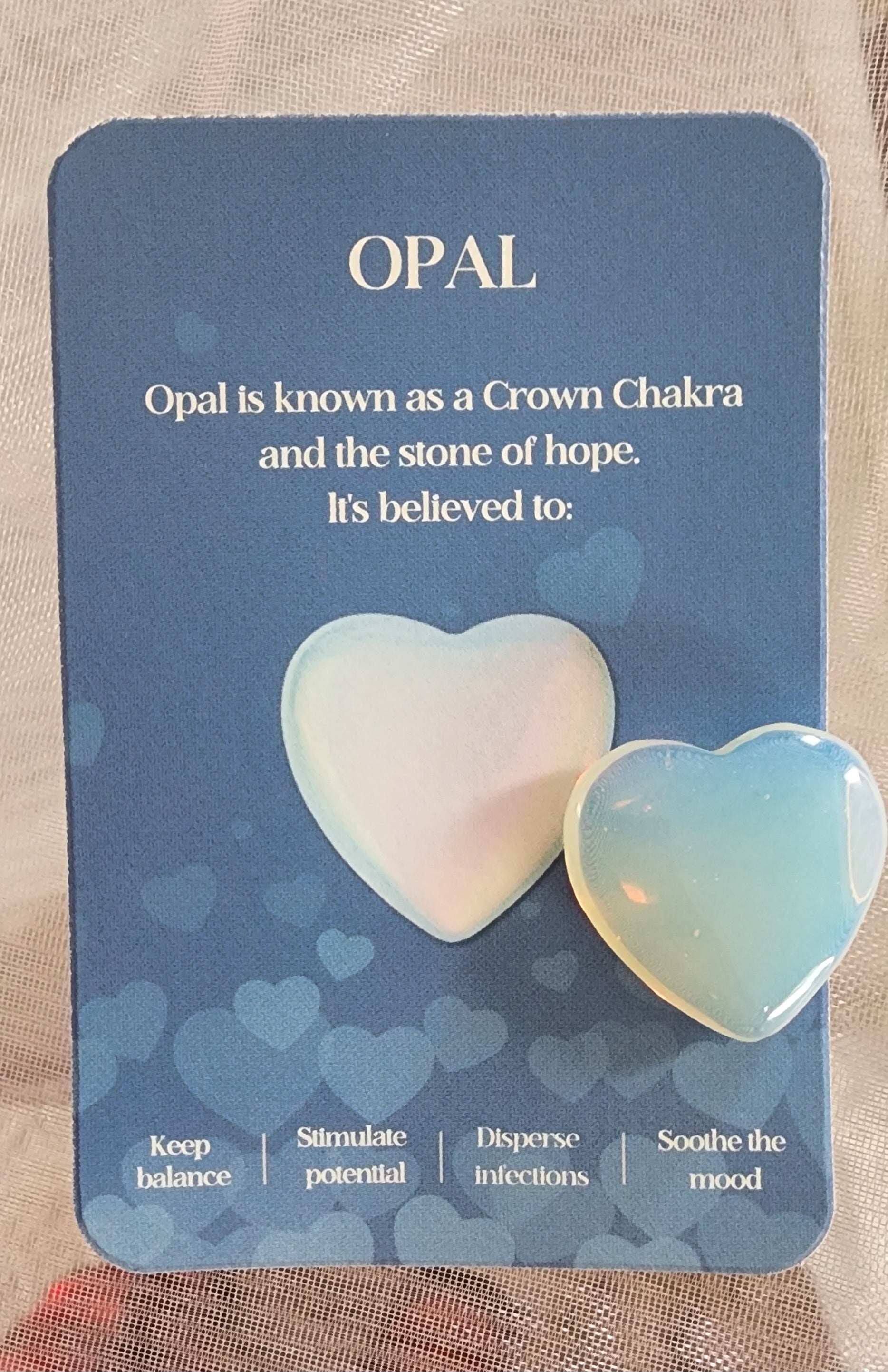 -Opal pocket size heart shapped stone