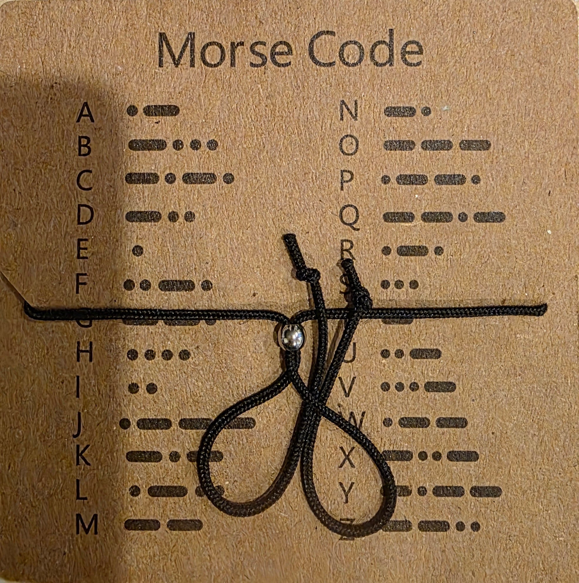 Pulsera «Nunca te rindas» en código Morse