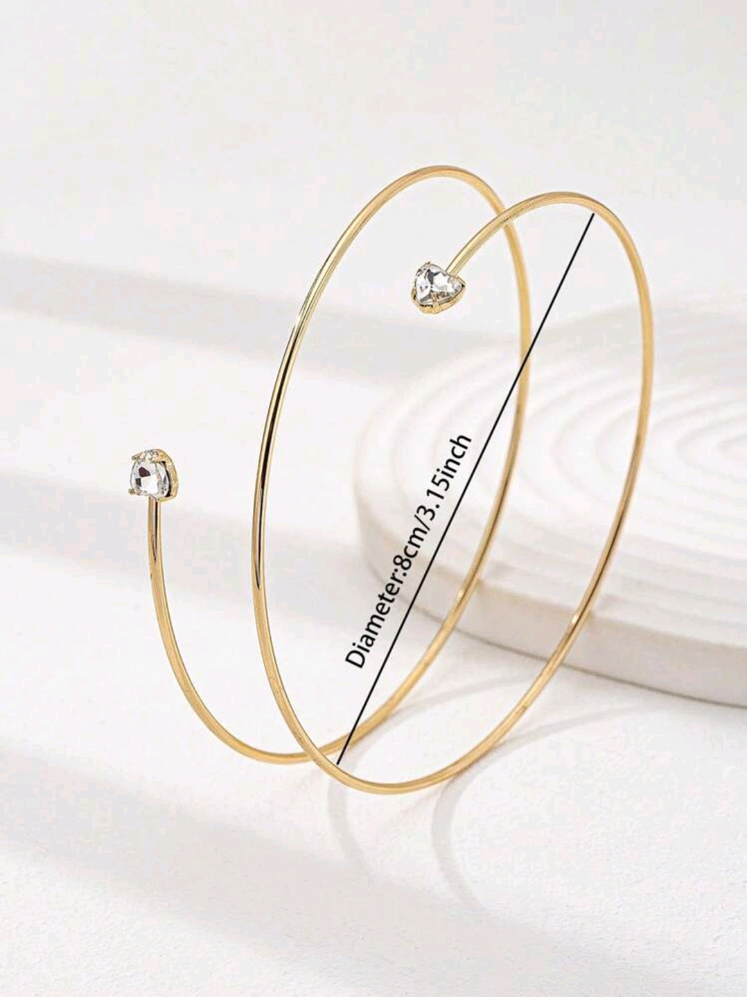 Gold arm bracelet