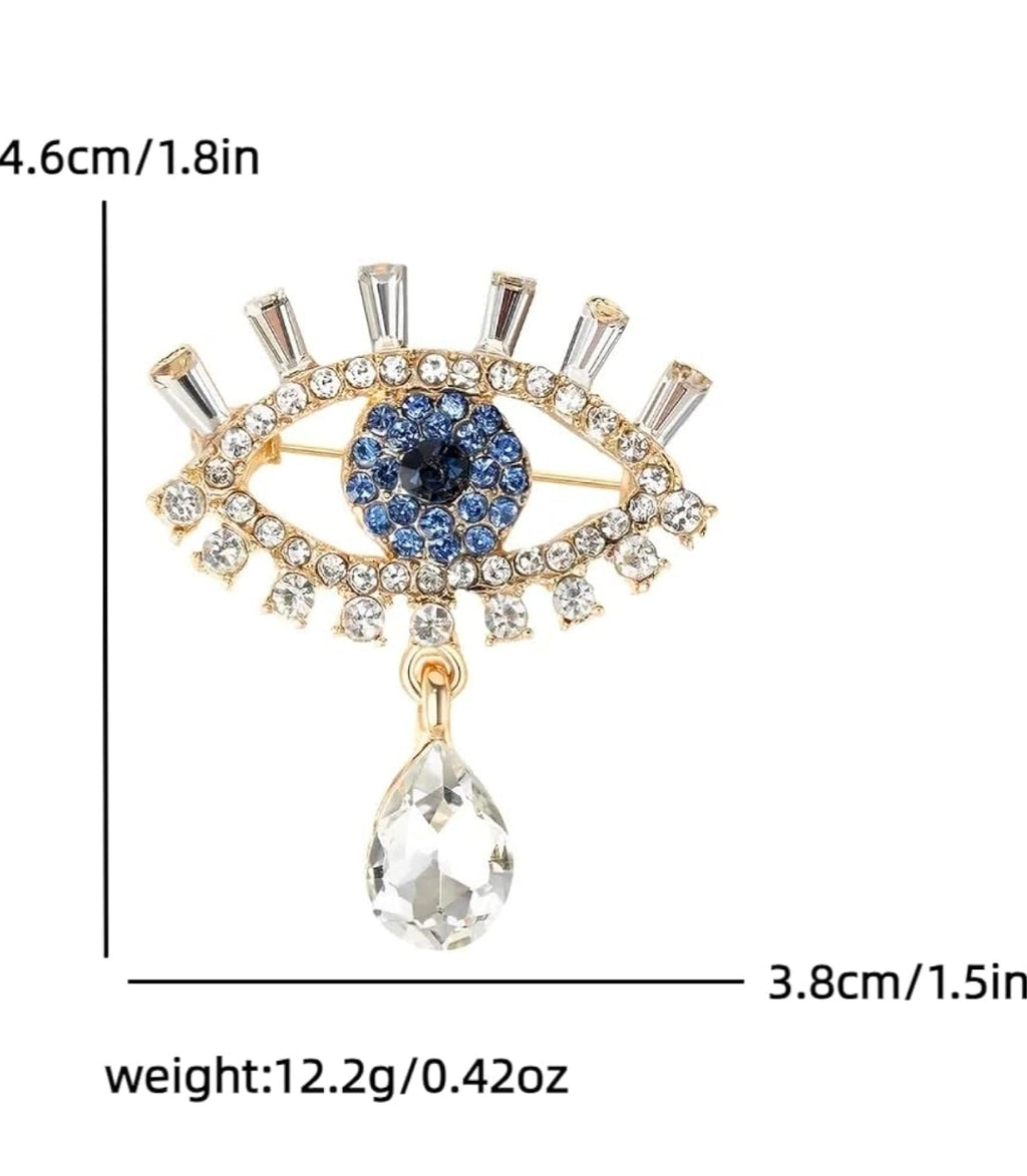 -Crystal evil eye brooch