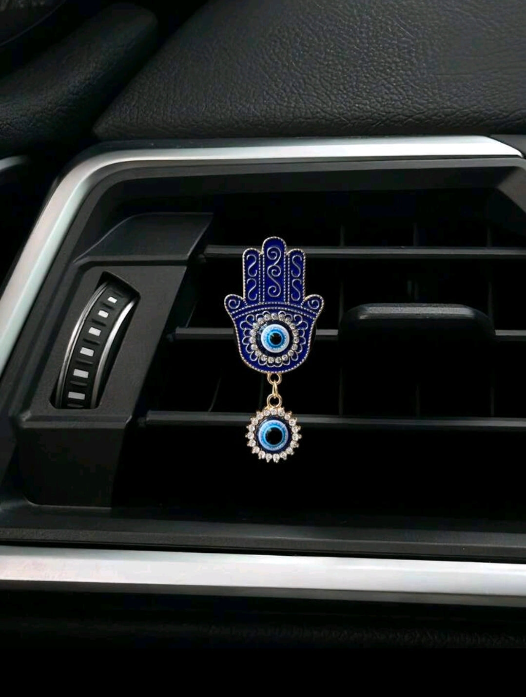 Clip para rejilla de ventilación del coche Hamsa
