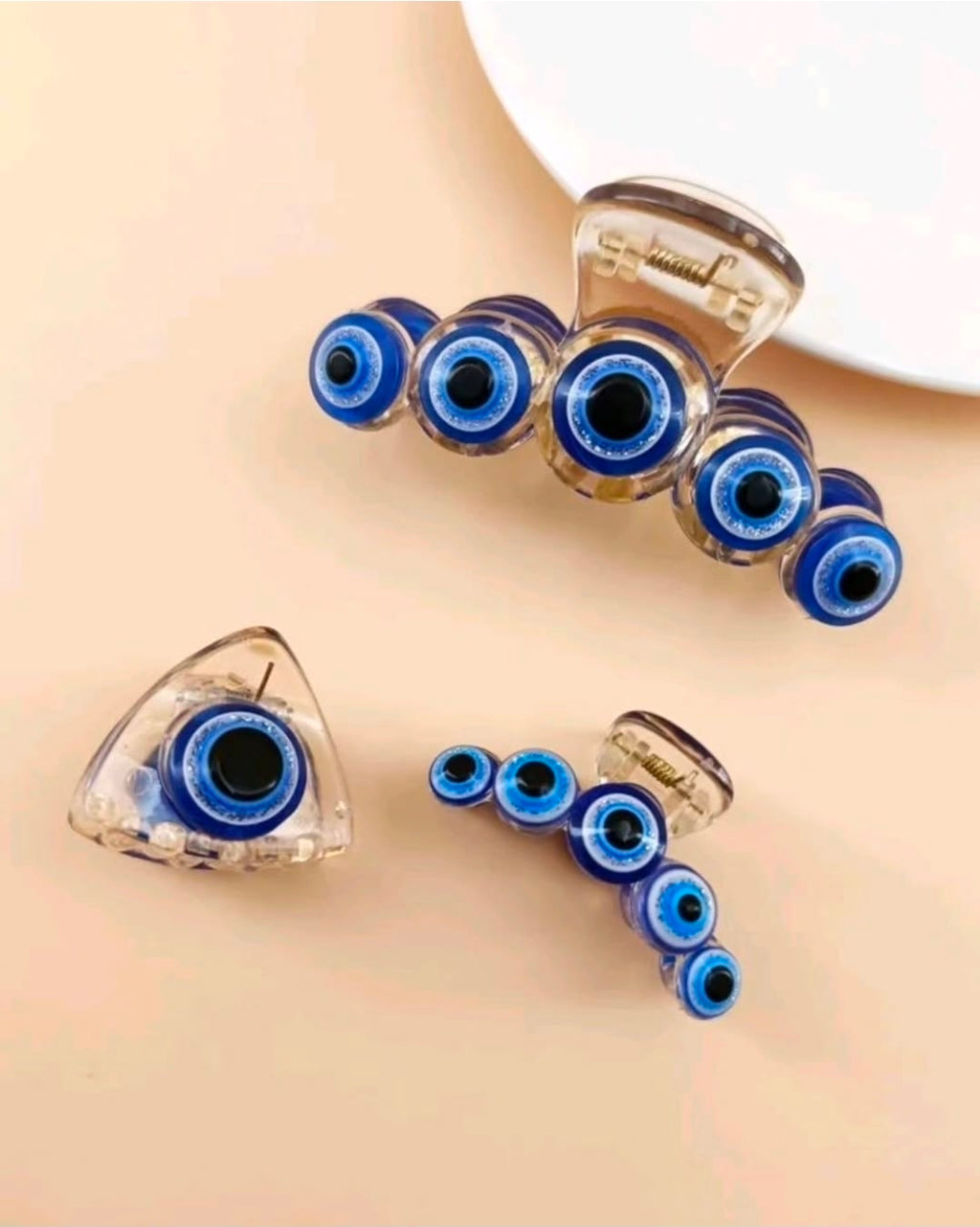 -3 pinzas para el cabello de plástico transparente con forma de ojo turco azul