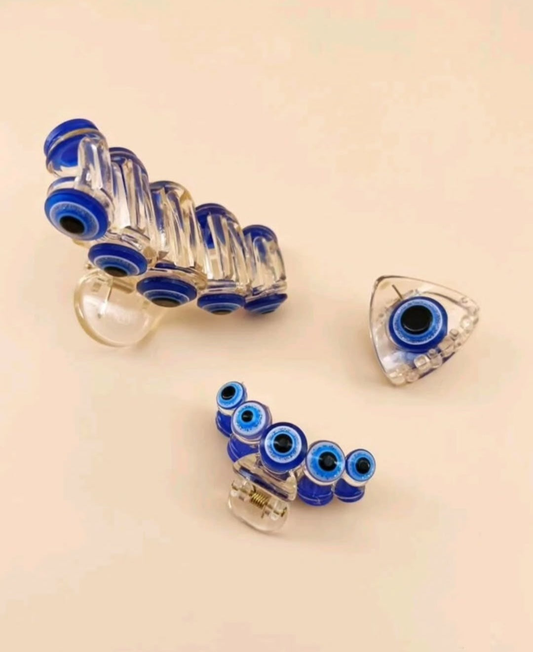 -3 pinzas para el cabello de plástico transparente con forma de ojo turco azul