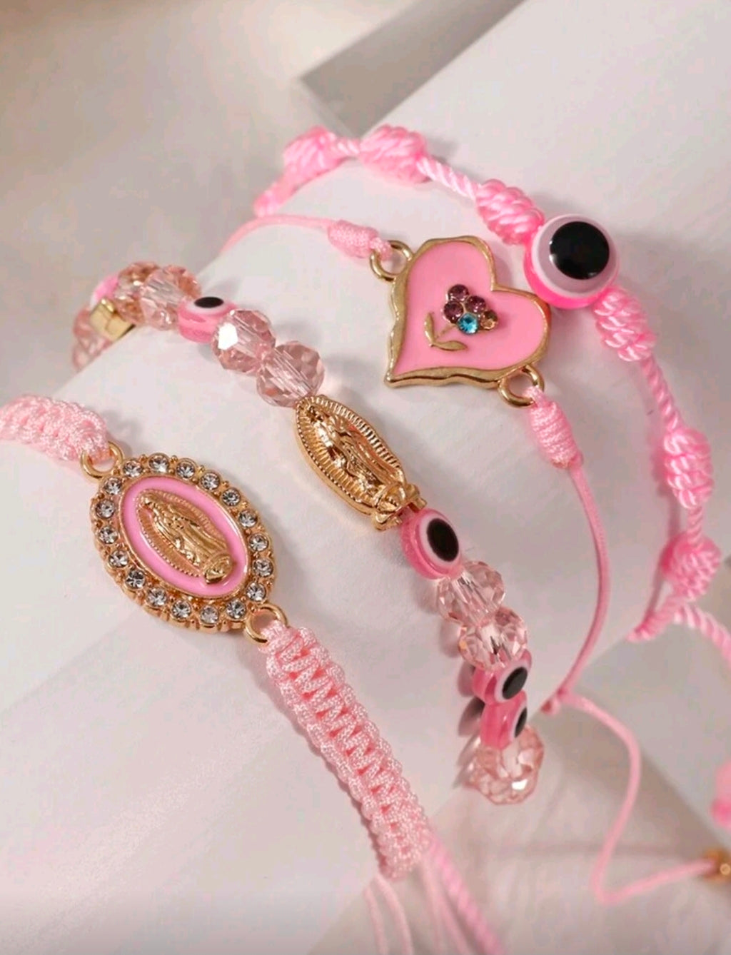 Four pink bracelet set