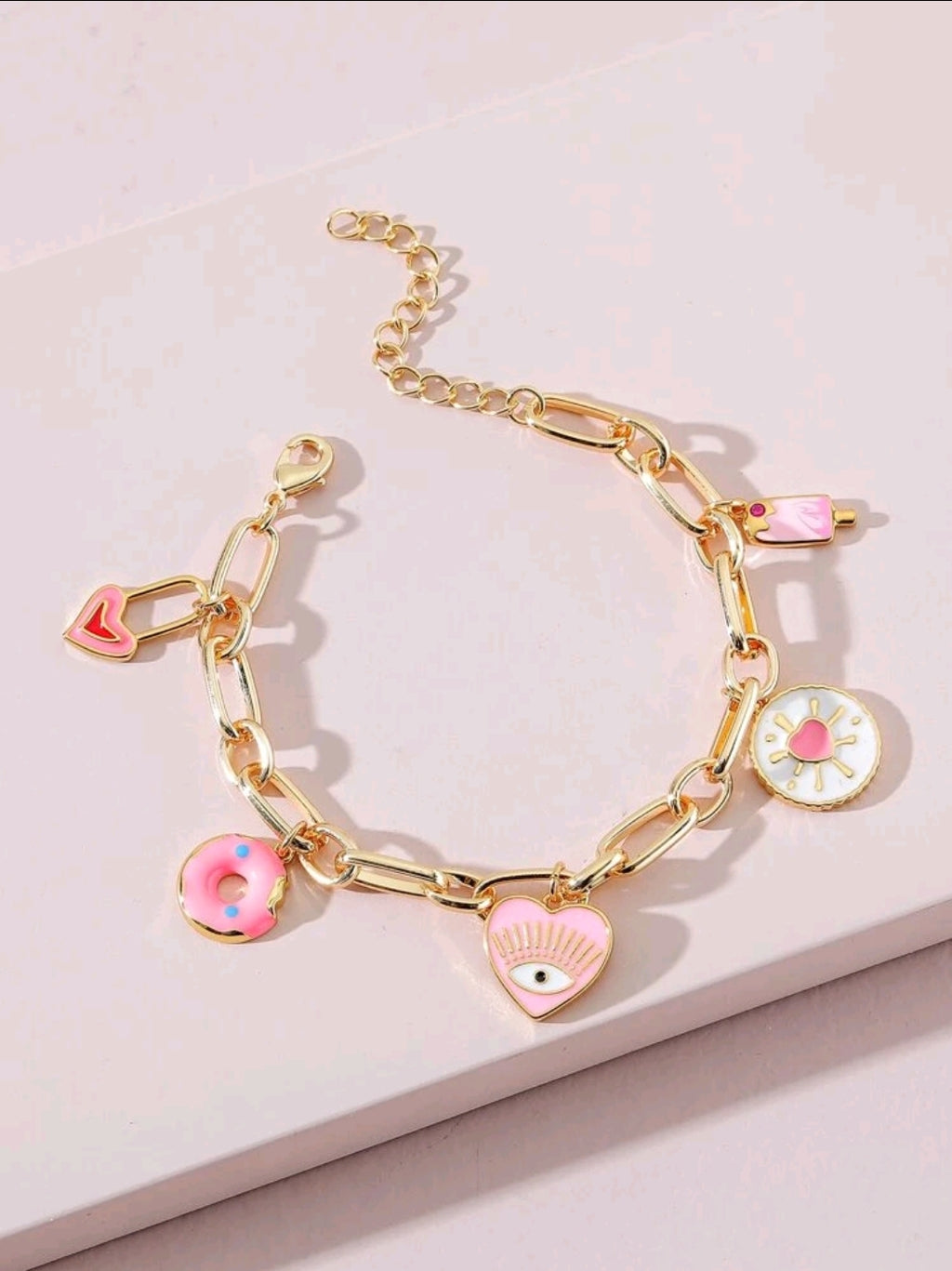-Pulsera protectora rosa/dorada