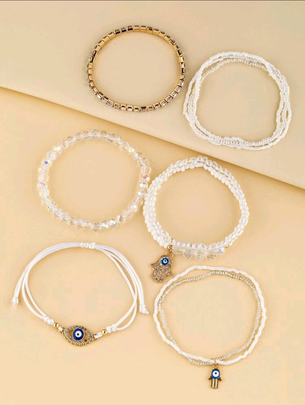 -9 piece white evil eye bracelets